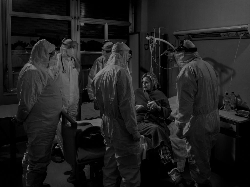 Magnum photographer Alex Majoli took this scene when the doctors announce to a patient her healing from Covid-19 on 29 April 2020, in Ragusa, Sicily