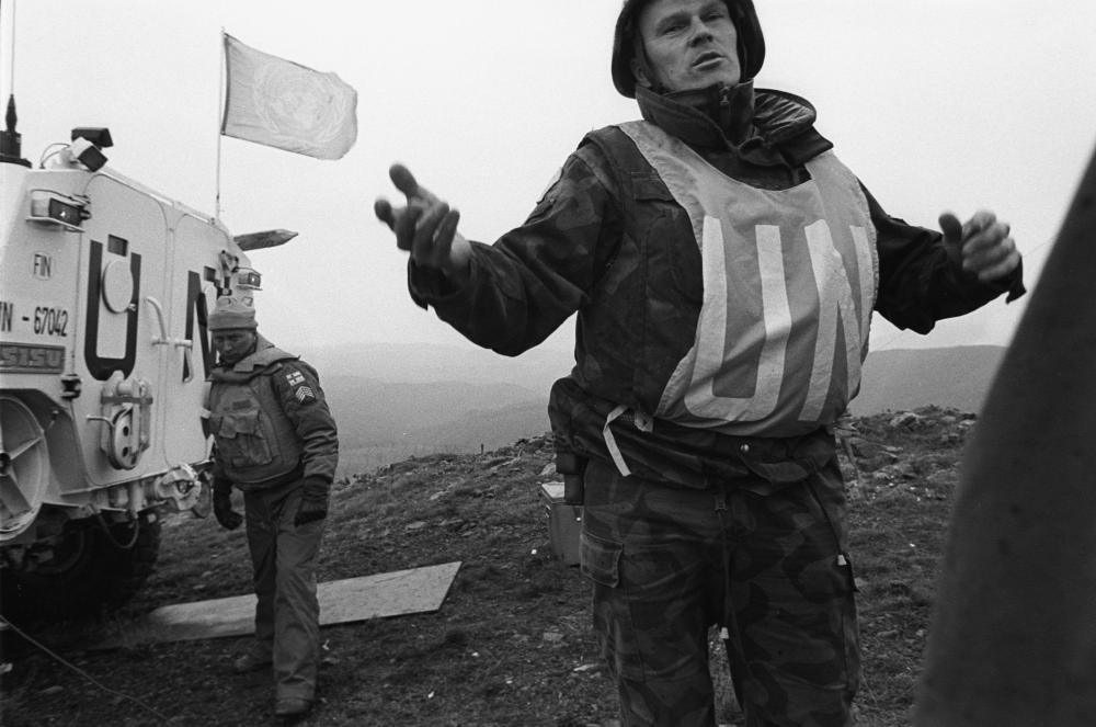 The image above shows a team of the United Nations Deployment Force patrolling the North Macedonia – Kosovo border in 1998, by Nikos Economopoulos