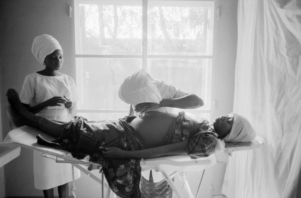 This mother-to-be was photographed by Guy Le Querrec during her consultation at one of the social centers in Fort-Lamy, Chad, in 1970.