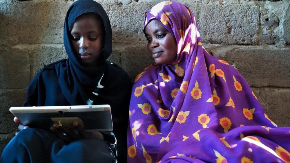 The above scene was taken, by UNICEF, in Sudan where E-learning is an alternative to protect the right to education when students are affected by recurring floods