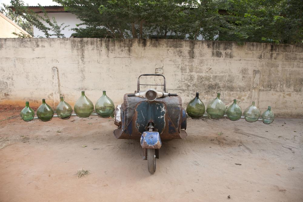 Romuald Hazoumè (Porto-Novo, 1962 - ) Petrol Cargo (2012) Mixed media installation, 120 x 450 x 180 cm